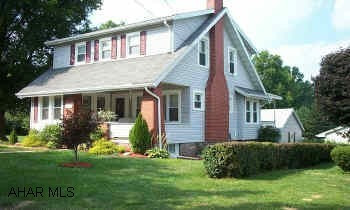 Completely remodeled, very well maintained,  vinyl & brick 2 story, 3 bedroom, sunroom, brick gas fireplace, new central air, gas furnace, hickory kitchen, new roof, windows, & covered deck, 161x90 lot, one car garage.                                    Well maintained, 2 story vinyl & brick with 3 bedrooms, sunroom, brick gas fireplace, completely  remodeled with new central air, gas furnace,  hickory kitchen, new roof, windows, & covered deck, one car detached garage, all on a large nicely landscaped 161x90 lot in a great area convenient to everything.  Delayed possession - building new house.