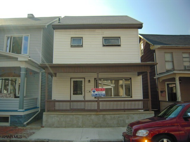 Newly renovated with new countertops, laminate flooring & carpeting, walk up attic with heat makes 4th bedroom or bonus room.  Vinyl siding, thermopane windows, newer roof, off street parking, nice backyard with deck & patio area.