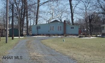 Being sold "As Is."  One story with porch.  Directions:  I-99 S.  Exit 10; R on to Sarah Furnace Rd; L onto Wm. Penn Rd.  R onto PA-869/Heritage Rd.  L onto Covered Bridge Rd. R onto T574.  T574 becomes Gordon Hall Rd;  L onto Fish Hatchery Rd; turn right onto Wayne Blvd.  House (green) on left.