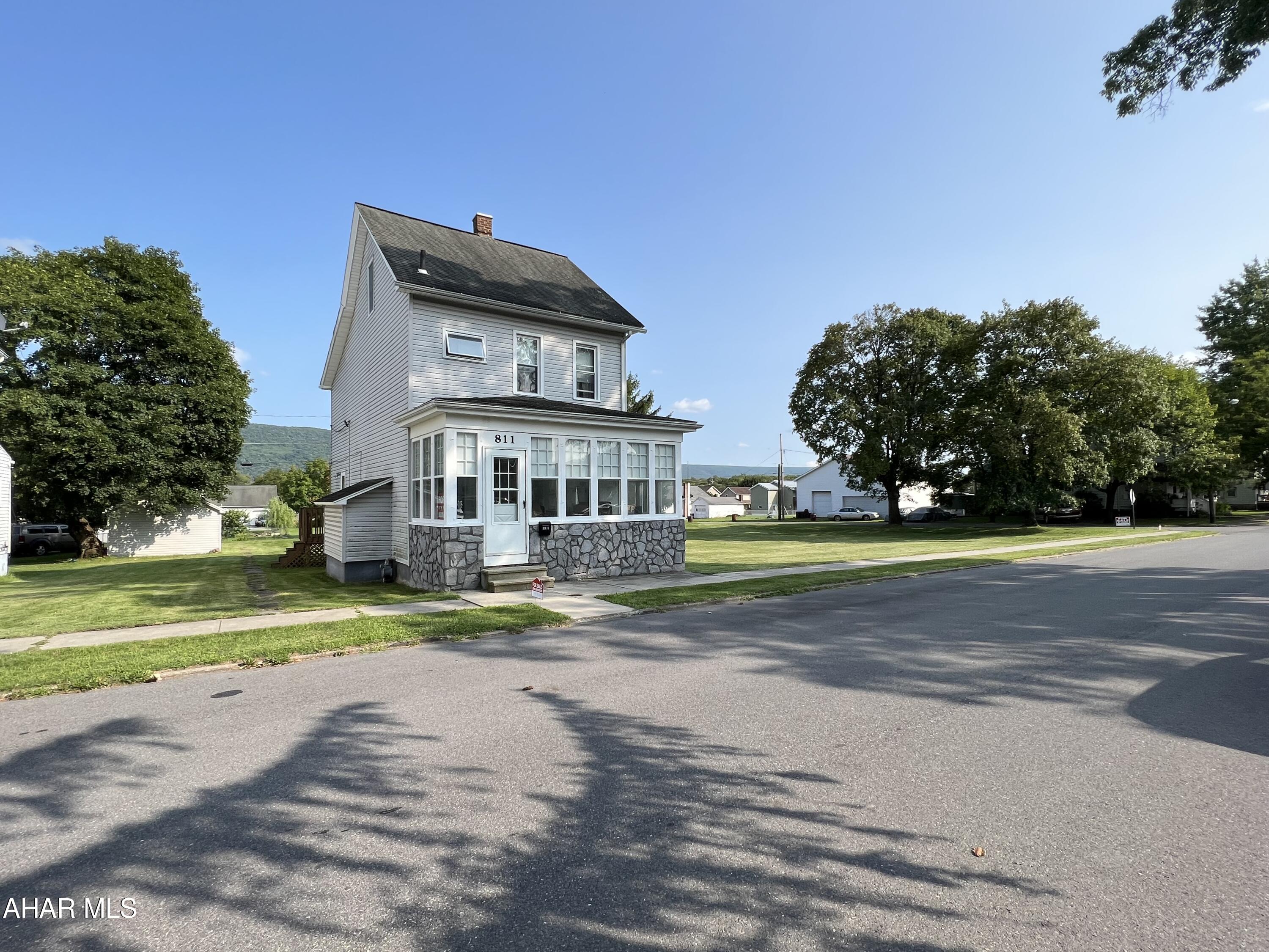This 3 bedroom 1 bathroom home is situated on a gorgeous double lot in the Bellwood Borough.  The first floor has a spacious sunroom, living room, dining room, and eat-in kitchen. The large covered deck offers you a great space to escape from the sun or shelter you from the rain. This home also has a detached garage to offer off street parking.  Make the updates you prefer to make this house your home!

More pictures to come!