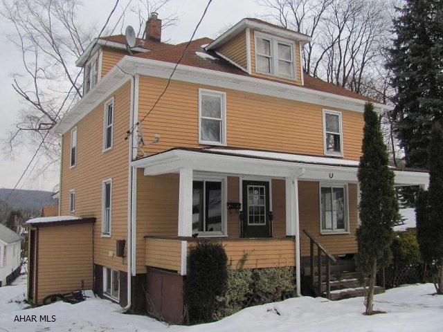 Nanty-Glo 4BR home on approx 1/2 acre lot. Hardwood floors, oil hot water heat.