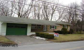 Has a Florida room. 3 Bedroom rancher, large corner lot, hardwood floors.    Tax ID #'s are   14-10B-24-1 & 14-10B-24-2
