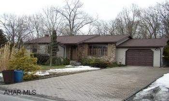ONE STORY WITH FINISHED LOWER LEVEL.  ONE BEDROOM WITH BATH ON LOWER LEVEL. LOGAN TWP.  THE EASE OF ONE STORY LIVING.  THIS WELL BUILT HOME FEATURES EAT-IN KITCHEN, PRIVATE REAR PATIO, WOODED SETTING IN REAR, AND TOTALLY FINISHED LOWER LEVEL.  VERY LOW UTILITIES.  OUTBUILDING 12X12.