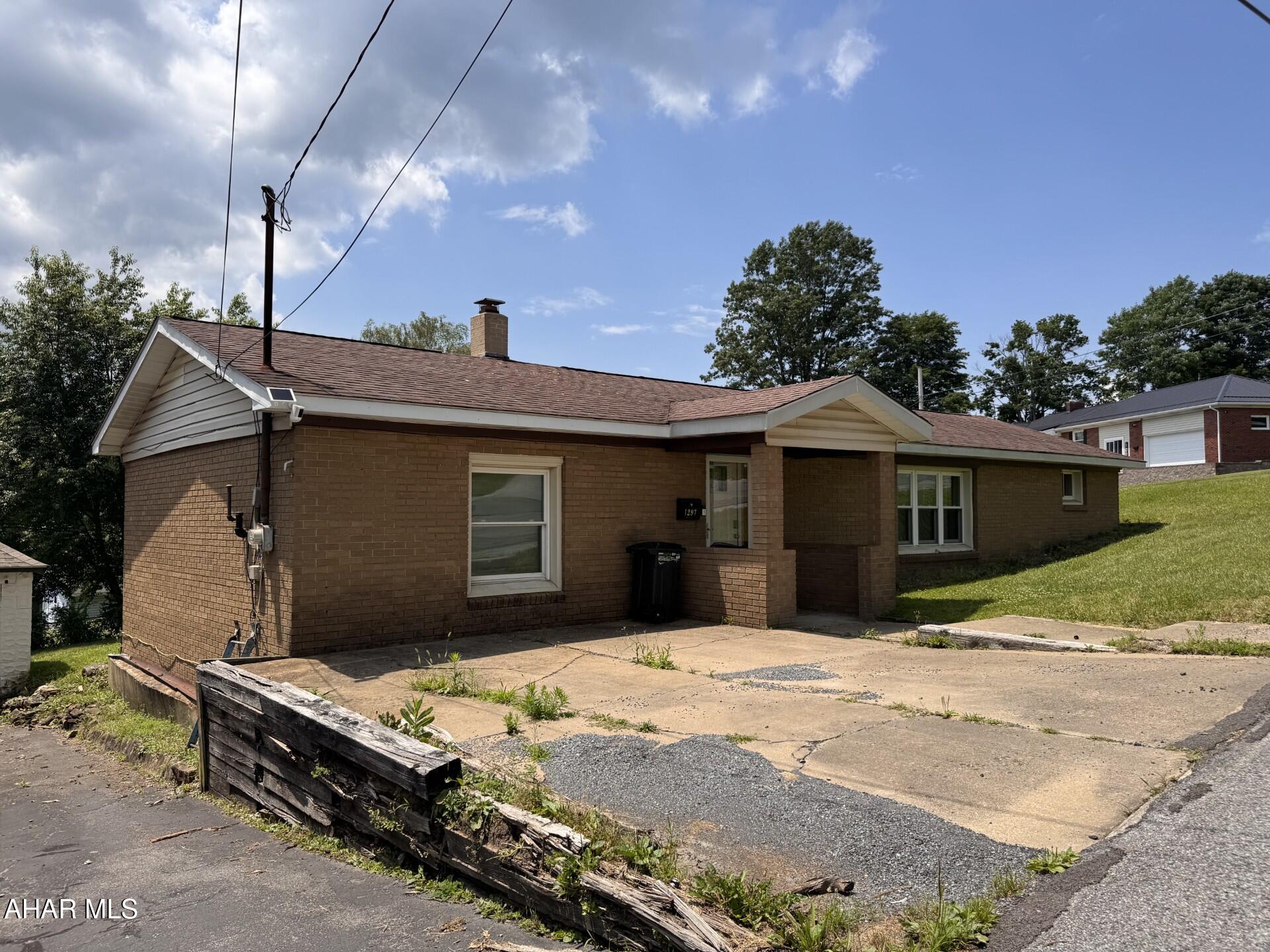 3 BR, 1 bath brick ranch home on corner level lot.  Home features eat in kitchen, spacious LR & FR, laundry & storage area.  Oil, hot water BB heat.  Large rear deck for entertaining or just relaxing.  Off street parking.