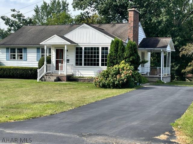 Location! Location! Location! Cozy 3 bedroom, 1 bath house in a great location. Beautiful hardwood floors. Wood burning fireplace in the living room. Original french doors. Central air. Ample storage space. Attached garage. Workshop area in basement.