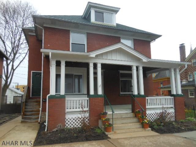 Large & wonderful solid 3 story brick home in the Borough. 4 bedrooms, 2.5 baths, new roof, hardwood floors. Has been used as a duplex but currently a single family home. Owner was in process of renovations. Can still be duplexed too! Finished 3rd floor & lower level...cool retro kitchenette Relaxing front porch to enjoy summer evenings. Full bath on the main level ..  Pocket doors between living room and dining room. Large room and lots of windows for a bright and cheery home. Front staircase can easily be opened. Two parking permits included and home warranty. This home boasts 2554 sq feet of finished living space on main levels and 1264 sq ft in basement.