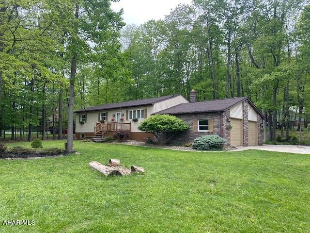 Home with a view of the lake.  Looking for a quiet place with plenty of room.  Come see what this home has to offer.  Corner lot with 3 season back porch lets you take the enjoyment outside as well.  New kitchen, heating and roof, Home inspections is available upon request.  Listing agent is owner.