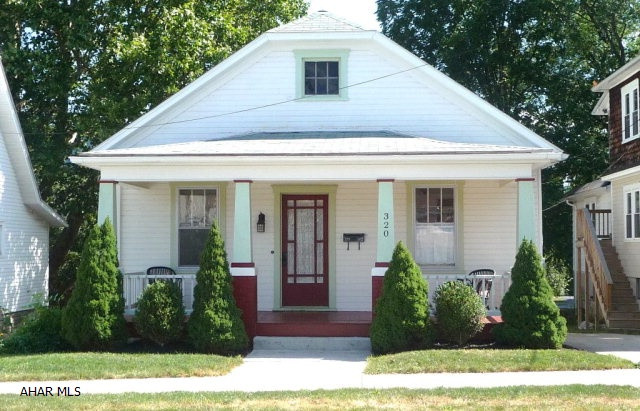 Charming craftsman style home in convenient, in town location close to schools, shopping and library. This beautiful home has been lovingly restored with beautiful finished hardwood floors and natural woodwork. A cute period kitchen with stainless steel appliances, formal living room, dining room and bonus room complete this two bedroom and one full bath property. The home also offers front and rear covered porches, a nice partially fenced backyard with mountain view, walk-out basement and off street parking. A walk-up attic provides extensive storage and affords potential for additional living space. This historic Bedford home is in move-in condition and ready for immediate occupancy.