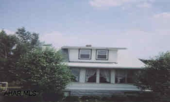 WALL BETWEEN KITCHEN & FAMILYROOM CAN BE REMOVED. ENCLOSED FRONT PORCH. SOME NEW WINDOWS.