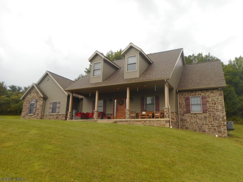 Truly a remarkable house - built in 2014 this home features a custom kitchen with center island and hickory floors, living room with 18' ceiling and propane fireplace, formal dining room, laundry, 1/2 bath, bedroom with bath off including jet tub and separate ceramic shower with rain head, and an office room. Most floors are solid hickory tg and drywall walls. First floor mostly 10' ceilings. Second floor has three bedrooms, full bath with separate dressing area and additional laundry room. LED lighting attached 2 car garage and too much to list!! The home sits back off the road for privacy and has a great view!