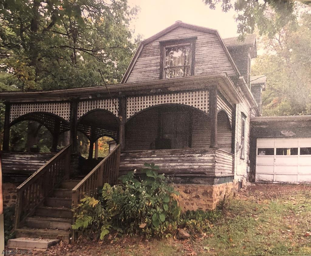 Off Frankstown Road on 3 beautiful acres. House is not livable and may need to be Torn down. DANGER -  DO NOT USE FRONT STEPS OR  WALK ON FRONT PORCH!  Beautiful  level lot to build your dream house. The home could be built in the back acreage. Mature oak, pine, black walnut and cherry trees.