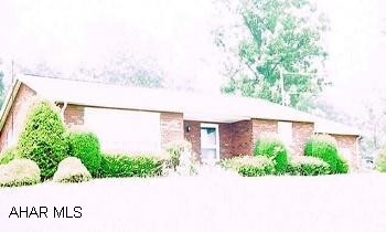 Three bedroom, 2 bath brick ranch home situated on 1.407 acres Brick Ranch with large lot. Fruit trees, and utility shed. Two car garage, unfinshed basement with outside entry, and breezeway.DVB 1073\419