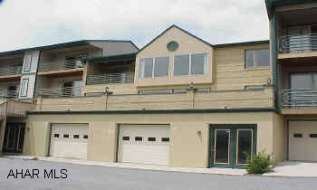 The middle level of this building houses a common room and shares mechanical systems.  The HOA includes trash, snow removal, building insurance, and yard maintenace.  The sale included center area formerly the "Party Room".  Center area consists of approx. 1500 sq. ft., recreation area with wet bar, shower room with 2 shower stalls & 1 urinal & storage room.