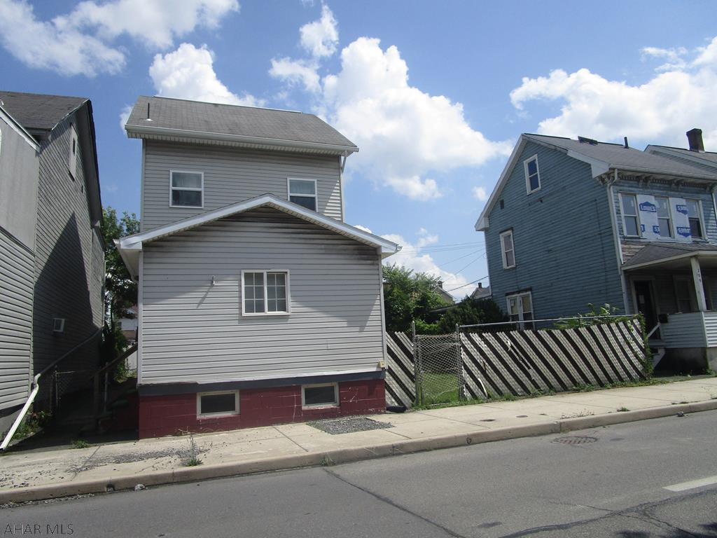 2.5 story of in the city of Altoona. 3 bedroom with a finished attic that could be a 4th. Spacious living room and dining room. Enclosed porch could be playroom or office. Updated kitchen and bath. 1st floor 1/2 bath with laundry hookups. Mud room off back door. Plenty of off street parking. Double fenced lot!!!