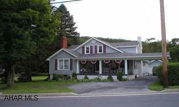 Move in condition - beautiful home w/ 2 lots (58x141 and 48x141), above ground pool w/ 2 tier deck, garden pond, carport and 2 car garage.  Ceramic tile, fireplace, first floor laundry and much more - VERY NICE! Large eat-in kitchen w/nook that has cathedral ceilings and a sliding glass door that leads to the deck and pool.  Must see!