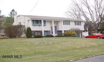 Quiet street in Bedford Boro & close to town.  Private & relaxing rear deck off the living room for family gatherings.  Newer kitchen cabinets, large family room in basement w/woodburner, ceramic tile floor, & half bath.  Hardwood floors in LR, & BR's.  Half Bath off Master Bed Room.  Ceiling fans & pull down attic.