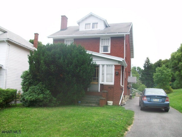 Nice brick home in need of some tlc on a spacious lot in the city.