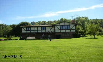 RAISED RANCH ON 1.75 ACRES. FAMILY ROOM WITH WOOD BURNER. TUDOR STYLE. 3 BR, 1.75 BATH. GREAT VIEW. POSSIBLE SELL OFF OF REAR OF PROPERTY. ATTIC IS PARTIALLY FLOORED FOR STORAGE.