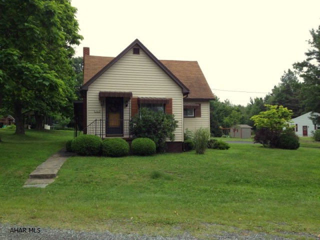 This meticulously maintained home located at the edge of Blandburg is a must see. All original woodwork, newer windows throughout, open floor plan, mudroom with double closets, first floor laundry area, large living room, hardwood under carpet on first floor. Second floor has 2 bedrooms and a bonus room that was used as a bedroom, 2 large linen closets and walk in attic area. Plenty of outdoor room with a one car garage/one car carport with workshop, shed and pavilion.