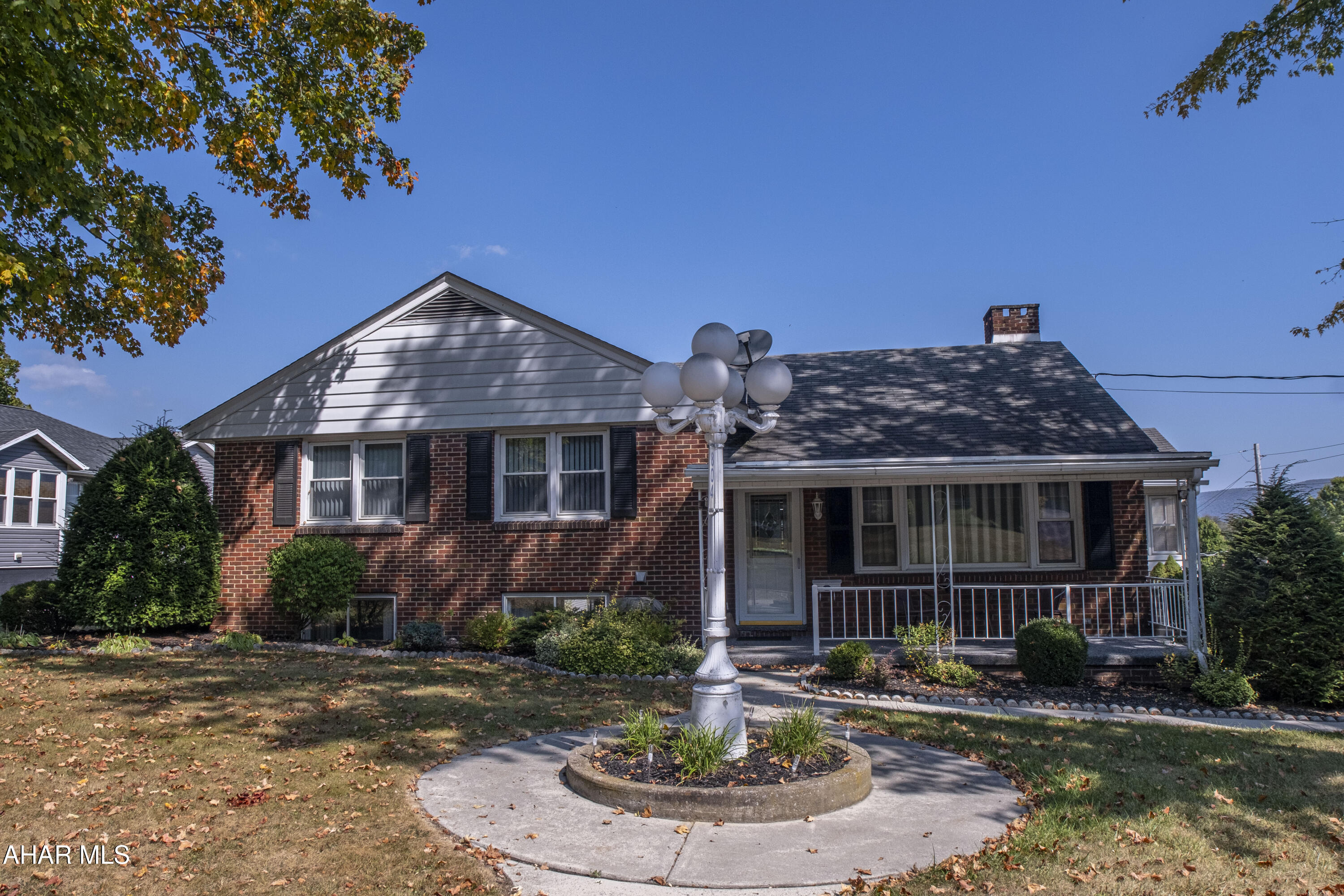 Welcome to this beautifully maintained brick home nestled on a desirable corner lot in  Williamsburg Borough. This residence seamlessly blends classic charm with modern comfort, offering generous living spaces both indoors and out.

The traditional brick exterior speaks to quality and durability. Inside, the home offers a comfortable layout featuring three spacious bedrooms and one full, well-appointed bathroom.

The main living area is designed for both relaxation and entertaining, boasting a large living room and an expansive family room, providing plenty of space for gatherings. The home's ambiance is enhanced by two charming fireplaces—
Storage and utility space are abundant thanks to a walk-out basement that offers easy access to the yard and a walk-up attic that provides great potential for storage or future development. Parking is convenient with a two-car integral garage that adds security and protection from the elements.

Situated on a beautiful corner lot, the property enjoys excellent curb appeal and a pleasant setting within the borough. This home is ready to provide its next owners with a perfect blend of space, comfort, and prime location. Schedule a tour.
