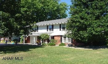 Raised ranch, excellent condition, in-ground pool, great location. Beautiful, custom kitchen 3 yrs, oak cabinetry, small island with eating counter. Great entertainment home. In-ground pool in rear with large concrete, brick patio. Deck off rear of home with roof gives overview of pool. 1st floor family room has patio door to pool. Also, 1/2 bath and lots of closets. Pool is 10 yrs, siding 5 yrs, shingle 3 yrs, windows 7 yrs, furnace and AC 2 yrs, 200 amp service 3 yrs. Ceramic tile entryway, oak bannister and treads to second floor. ADT security system.