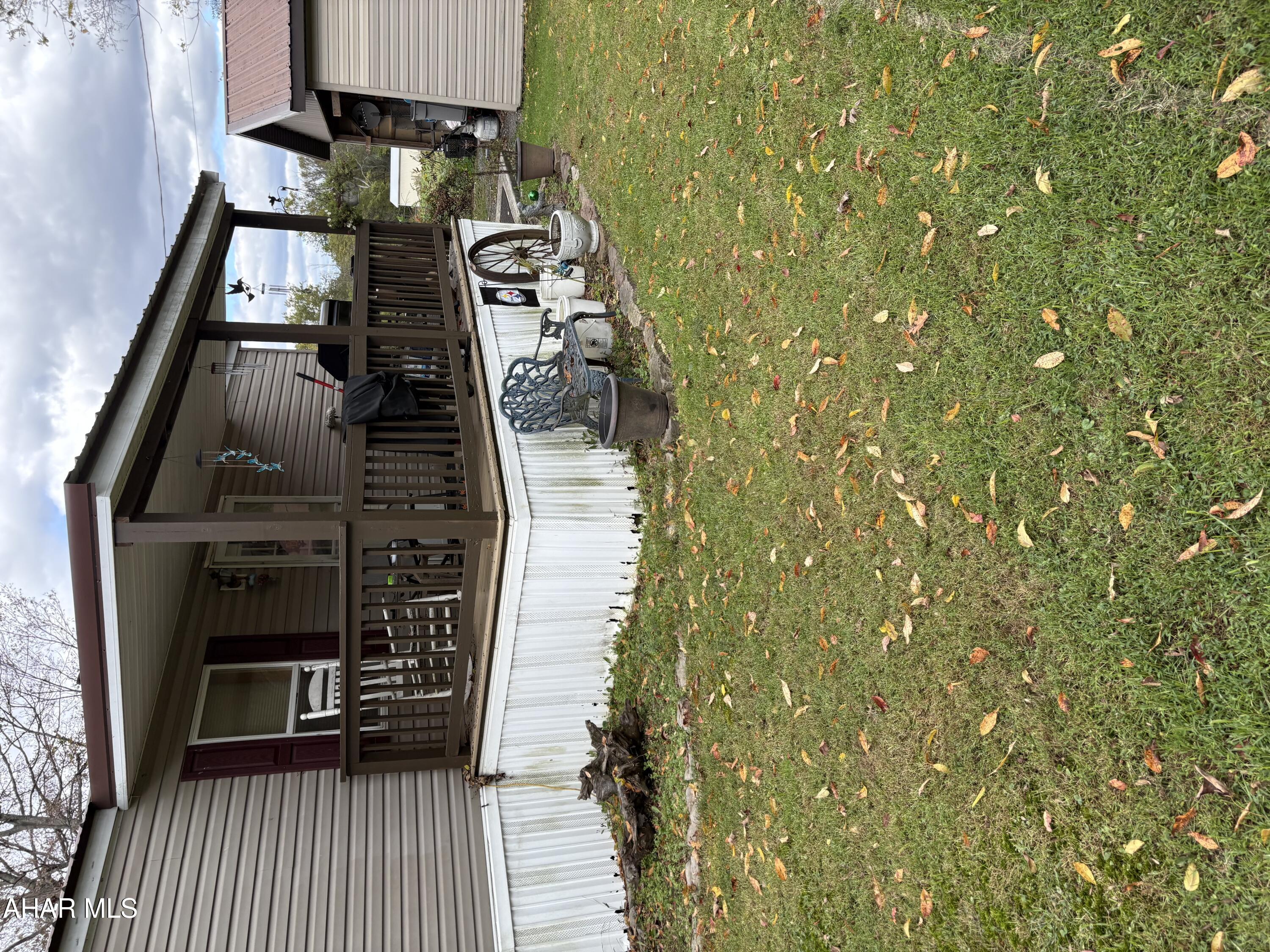 Affordable, low maintenance home with room to breath situated in a farm setting and less than 4 miles from Chestnut Ridge Schools. The layout is practical and comfortable, making it a good fit for a starter home, downsizing or investment use. Outside you will find both front and back porch, access to Dunnings Creek, a carport for covered parking and  a storage shed for tools and equipment.  The property provides outdoor space without the upkeep of larger acreage - ideal for a buyer who wants elbow room and water access without extra work. Settlement will be subject to approval of subdivision plan.