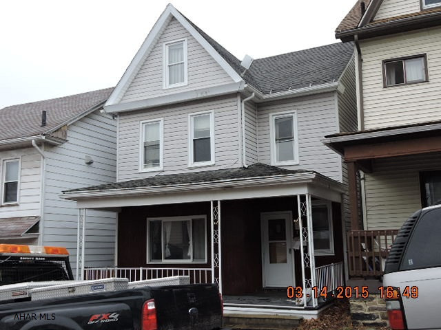 2-car detached garage & an enclosed in-ground pool. Pool building encompasses entire yard, no grass to cut and lots of summer fun all year long.  Finished attic could be 4th bedroom.  Newer thermo windows, siding, roof, furnace, & hot water tank.  Utilities have been off for at least 5 years.  As is sale.