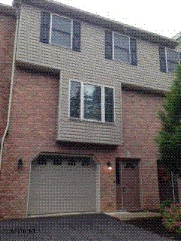 Well appointed townhouse in private secluded location. Ceramic tile and hardwoods, eat in kitchen, nicely maintained. $50 maintenance fee for lawn care and snow removal.
