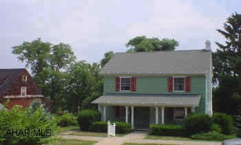 Impressive 2 story with large lot on quiet street. 3 bedrooms, 1.5 baths, 2 dens, many extras. House was frozen, but repaired.