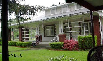 HOMEY CAPE COD, LEVEL LOT ON BRANCH OF JUNIATA RIVER. 2 BEDROOM, 1 BATH. BEAUTIFUL FIREPLACE, WRAP AROUND PORCH.  DARLING 2 BEDROOM, 1 BATH HOME IN BROOKS MILLS, HOLLIDAYSBURG SCHOOLS. 3/4 ACRE LOT LEVEL AND WELL MANICURED. FIREPLACE, 2 CAR GARAGE & CARPORT. DON'T MISS THIS ONE! CALL DARLA AT 696-1227 OR 934-4663.