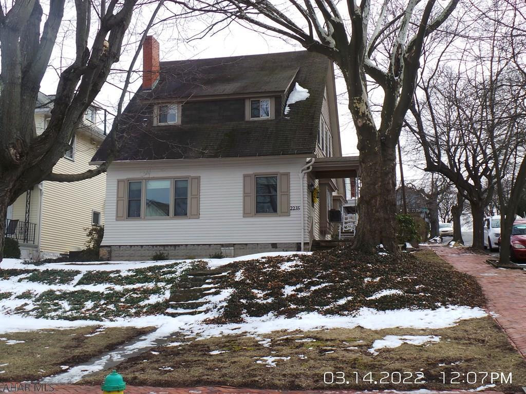 cute  2 story on corner lot with large living room, large dining room, nice  kitchen with appliances, newer windows, covered patio,  1 car garage.