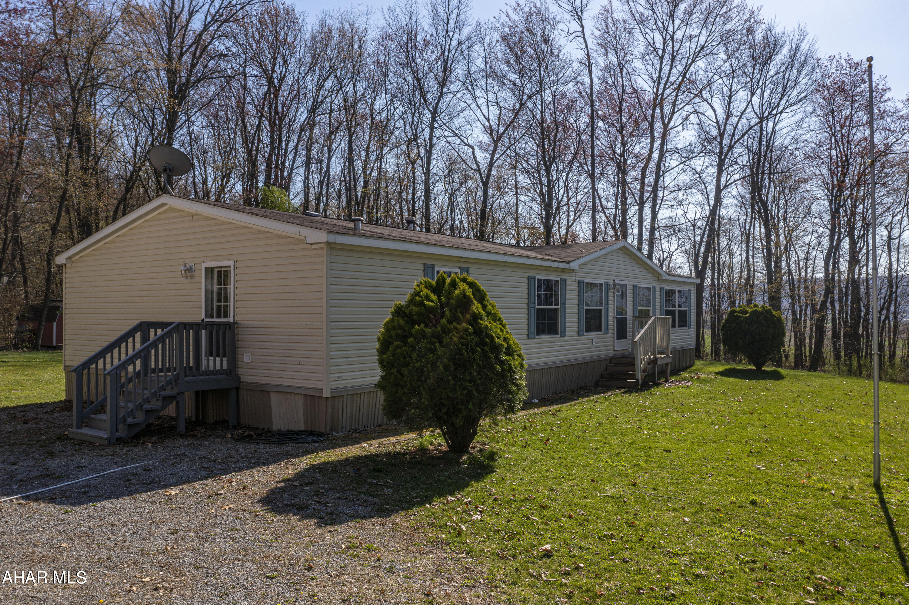 Spacious  3 bedroom , 2 full bath home surrounded by 2.26 acres in the Williamsburg  School District .This home features a large kitchen and dining room area and living room with a fireplace. Enjoy privacy on your own Master Suite with a master bath with jacuzzi tub and walk in closet. Carport and parking. A huge yard for a garden and out side entertaining. This is a must see. Schedule your tour today.