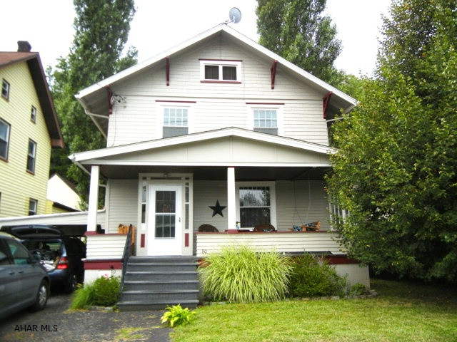 lovely 2 story home, Baker elemtary school, large eat in kitchen with ample cabinets and countertops, dining room has hardwood floors and french doors leading to living room. Windows on 2nd floor were replaced with thermopane (triple pane)  windows in 2008.  Provides off street parking w/carport.  Basement has finished room with drywall 3 walls (all but exterior wall) Back yard is private and offers rear deck and a 2 story shed w/elec