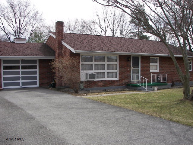 2 properties,1 price! Location!Location!Location! This low maintenance brick ranch home is within close proximity to the new library,schools,YMCA,and the Discovery Gardens at the Legion Park. Also 15 minutes to the shopping malls & plazas.This property was recently surveyed and subdivided into 2 deeded lots! The rear lot with the 26x30 outbuilding has approved ingress/egress from the cul-de-sac on Benton Dr. All utilities are available from Benton Dr. Upon sale the existing deed will be changed to 2 separate deeds.The back lot could be built on or you could use the existing outbuilding as a workshop,art studio,or for additional storage. Or you can save the back lot as a future investment, since this lot is one of the few building lots in the Hollidaysburg Borough. Agent related to seller.