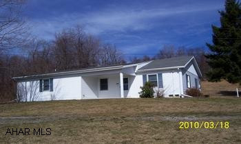 Well built quality home on private 7.3 acres. 2x6 walls,, hardwood floors. hemlock vaulted ceilings.