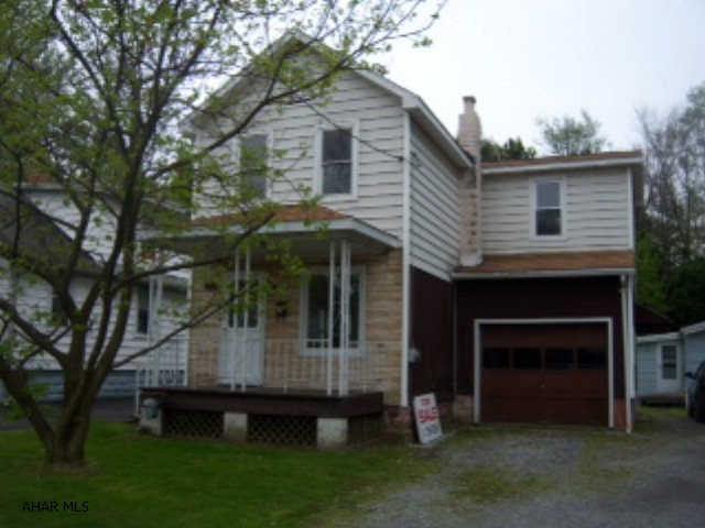 Nicely renovated 3 bedroom , newer kitchen, dining room, living room. Included mobile home is in very good condition--Great rental or in law property.