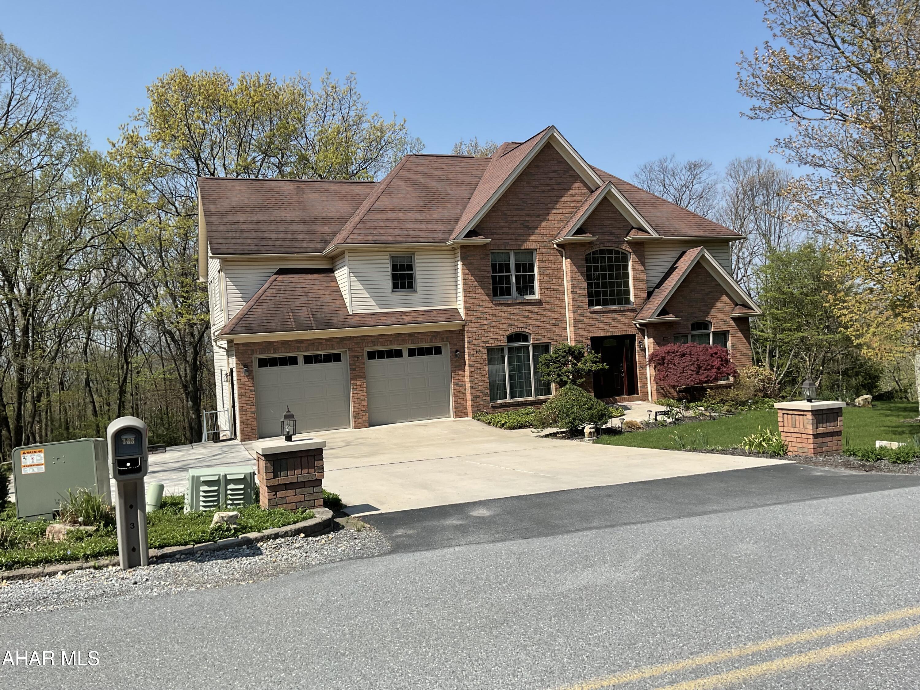One of Blair Counties most coveted neighborhoods!
This 4br(5th in basement) 3.5ba Sylvan East 2story 
Rests on 174x200' wooded lot! The walkout basement adds a third dimension to this home boasting full kitchen and mother in law suite! 
Walk out to back patio with hotub and fire pit area!  
Overlooking 5 tiered garden and nature at its most beautiful!  New HVAC system!
