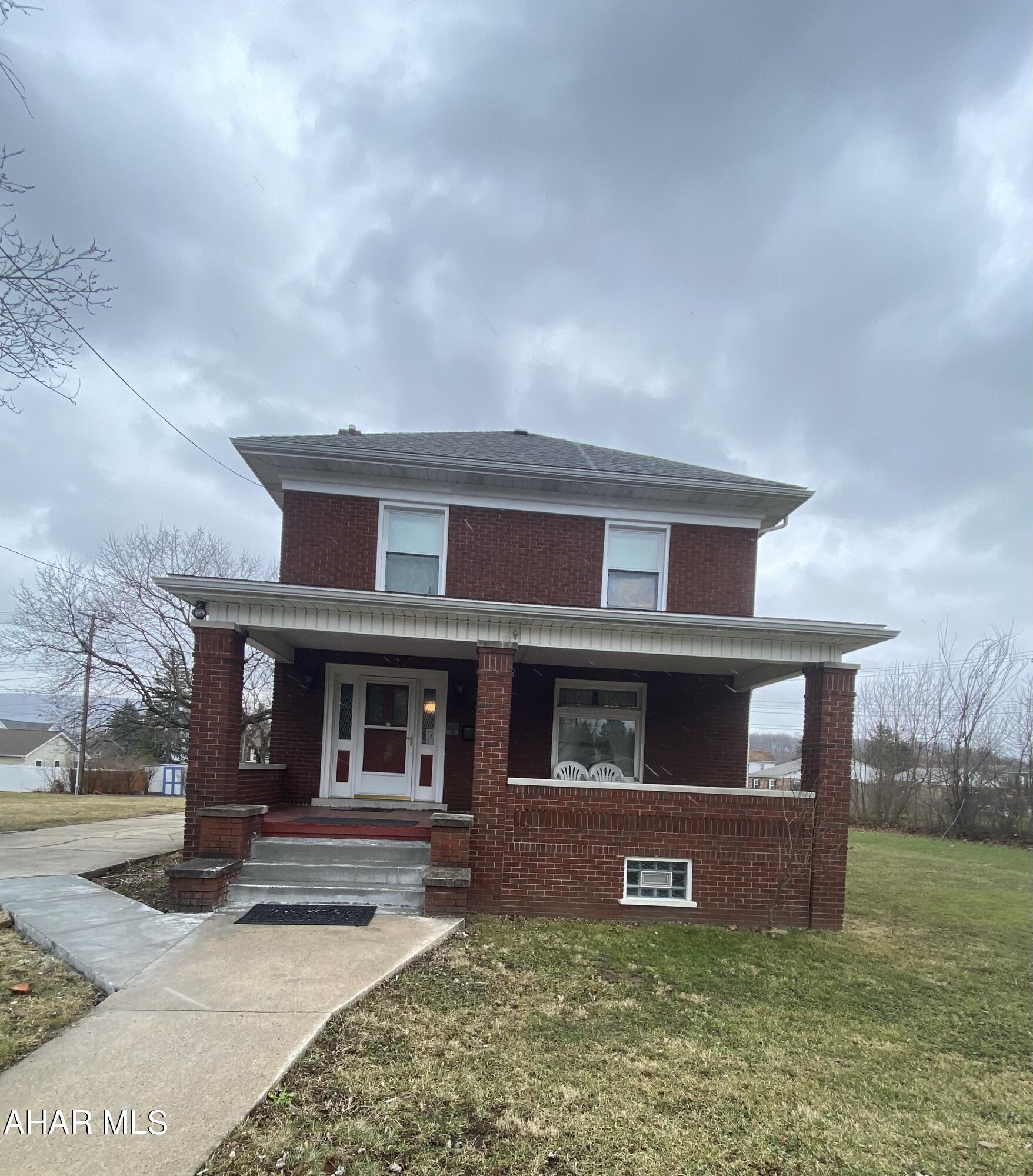 Large two story brick home sits on large lot in a convenient and central location of the AASD. This home has great structure and bones. Main floor living room, kitchen, and dining room with some original woodwork trim/doors. 3 spacious bedrooms with original hardwood floors and full bath on 2nd floor. Concrete driveway for multiple cars off-street parking.