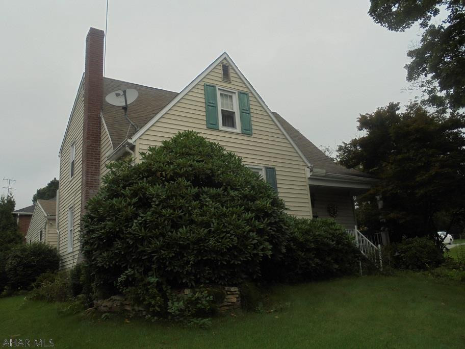 Ebensburg, PA -1 1/2 story vinyl sided 3 BR home on a 60x90 lot. Gas HW heat. 2 car detached garage.