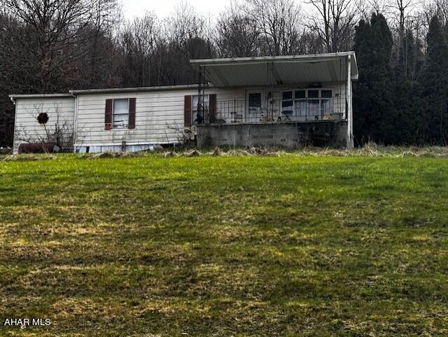 This 1982 doublewide offers a unique opportunity for someone with a vision and sense of adventure.  This home has many issues and a leaky roof and would need a trashout in order to decide if it is salvageable.  For anyone wanting a great lot to build a home, this may be the property for you.  It is 1 acre with public sewer and a well.   Don't miss out on the opportunity to turn a tear-down into a triumph.  Selling AS-IS