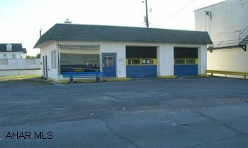2 bay garage plus 2 car storage garage on 100x150 lot. See Karen for restrictions on building. 2 bay garage plus 2 car storage garage on 100x150 lot. See Karen for restrictions on building.
