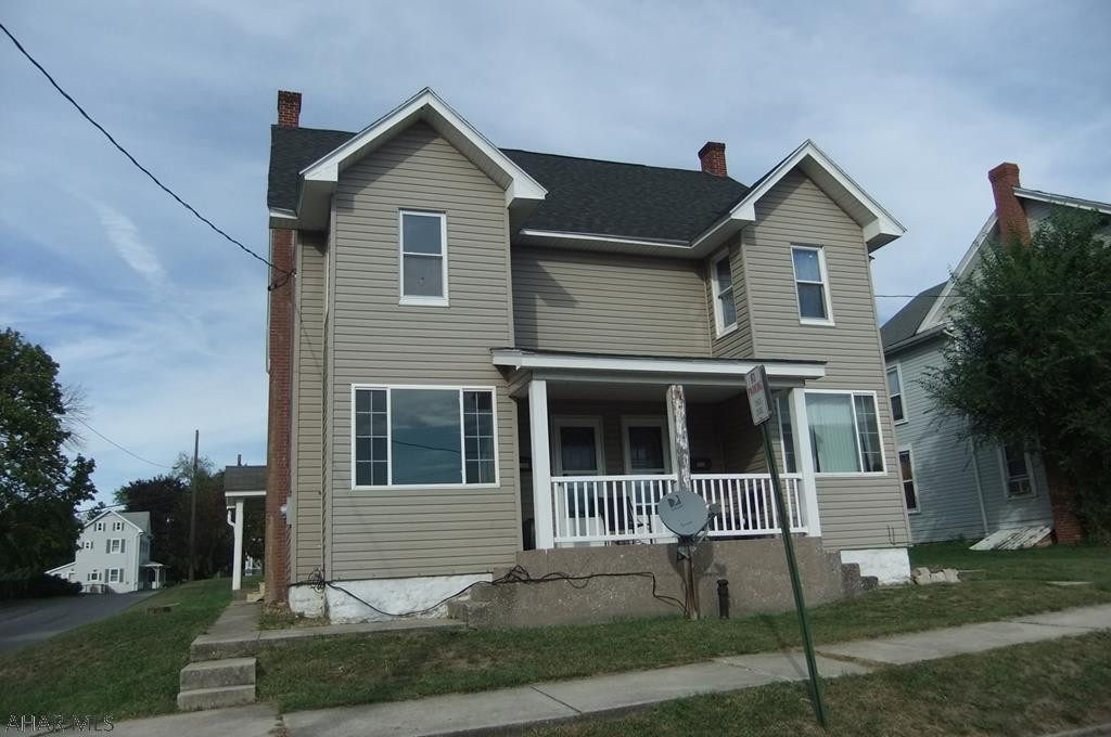 Roaring Spring 2 unit double house. Vinyl siding, vinyl windows with separate utilities for each side. Each unit has large eat-in kitchen, large living room, 2 bedrooms, 1 bath (bathrooms are captive to one of the bedrooms). Large walk-up attic for storage or possible additional living space (may need fire escape). Perfect for investors or live in one side and collect rent from the other side. Off-street parking to rear.