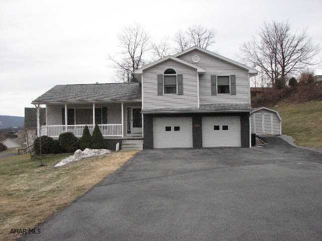 Wonderful neighborhood, awesome house with an open floor plan and lots of storage.  Beautiful foyer entry focuses to a stone fireplace in living room with marble accent and vaulted ceilings. A spacious kitchen with oak cabinets offers plenty of storage and eat in kitchen bar.  Dining room sliding doors welcome you onto a 12 x 16 deck looking over the spacious yard.  Kitchen and dining look downward to a lower level with wet bar and pool table area, with half bath.  Large master bedroom has vanity area, 5 foot tub and WIC, with laundry room off the bedrooms.  Lower basement has several options, for offices, gym area, workshop or 2 additional bedrooms.  New furnace in January 2014, with 90% efficiency and new hot water heater in June 2013.  14 year old roof with 25 year shingles.