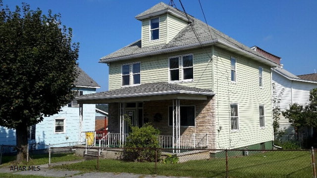 Great starter home with plenty of storage.  Beautiful original woodwork, fenced yard & off street parking.  2 furnaces  1 coal w/10 ton included & natural gas w/radiators