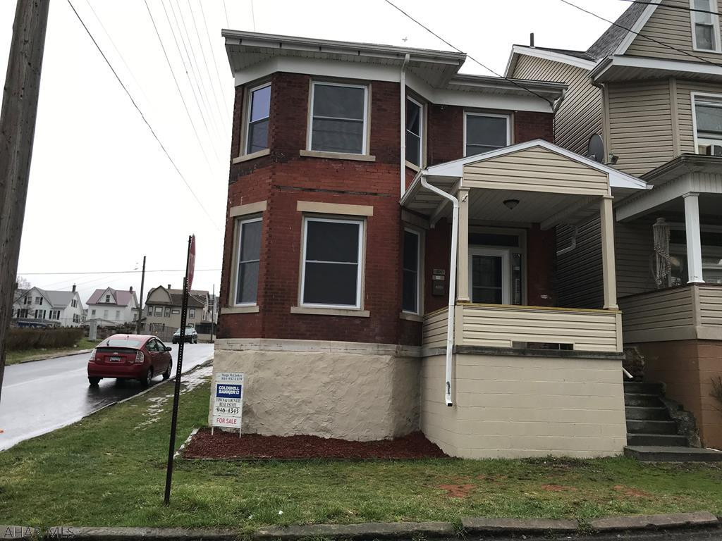 Remodeled interior with new kitchen and bath, carpet and flooring, windows, furnace and hot water tank.  All new appliances.  One car detached garage.  First floor laundry with pantry..