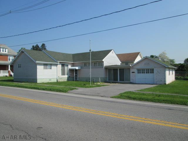 Bellwood corner lot. Three bedroom with two baths. New furnace, new central air and newer shingles. Cozy one story living. House being sold "As Is".