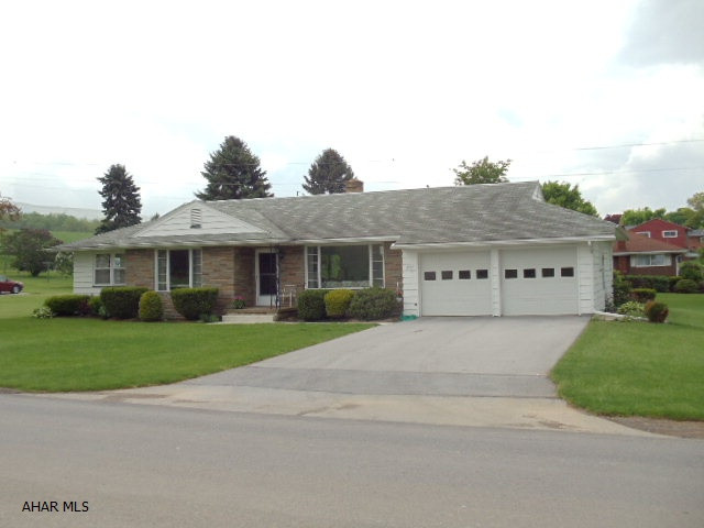 Convenient 1-story living with laundry room on main level, formal dining room, newer windows, & central air.  Beautiful distant views of mountains from back porch.  J-068