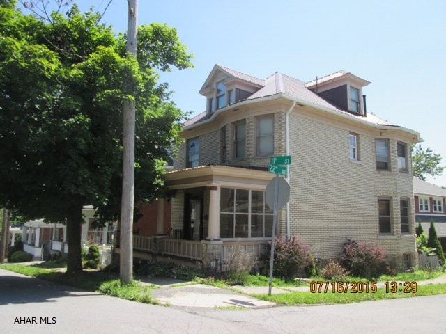 This charming brick home is a step back in time with a large foyer with beautiful original woodwork and a built in bench seat. It has a small fenced in yard. Kitchen and bath have been updated by this owner. Property is priced to sell AS IS.