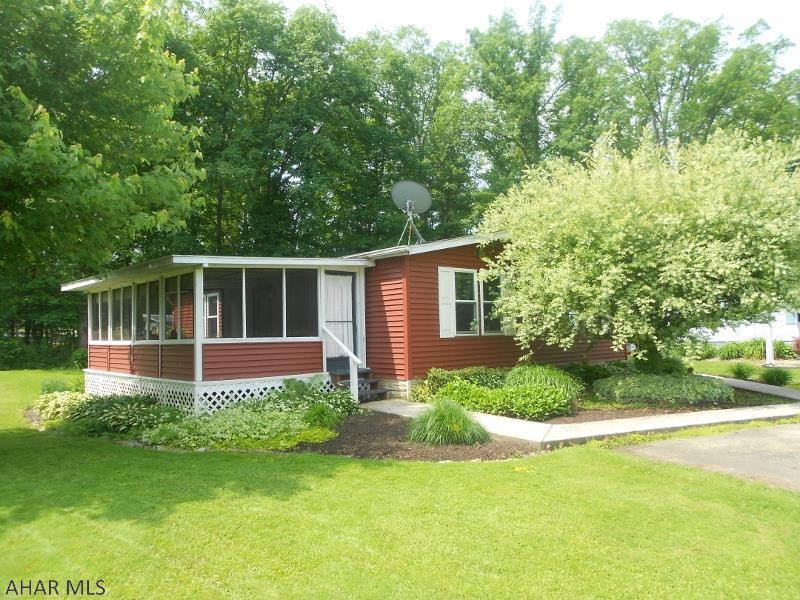 This 1988 Champion doublewide with 2 bedrooms, 1 bath is located in Friendship Village. Central air, shed and easy care landscaping. Lot rent is $265 and includes garbage and main road maintenance. Don't wait and miss out on this deal. Must be approved by Friendship Village prior to purchase.