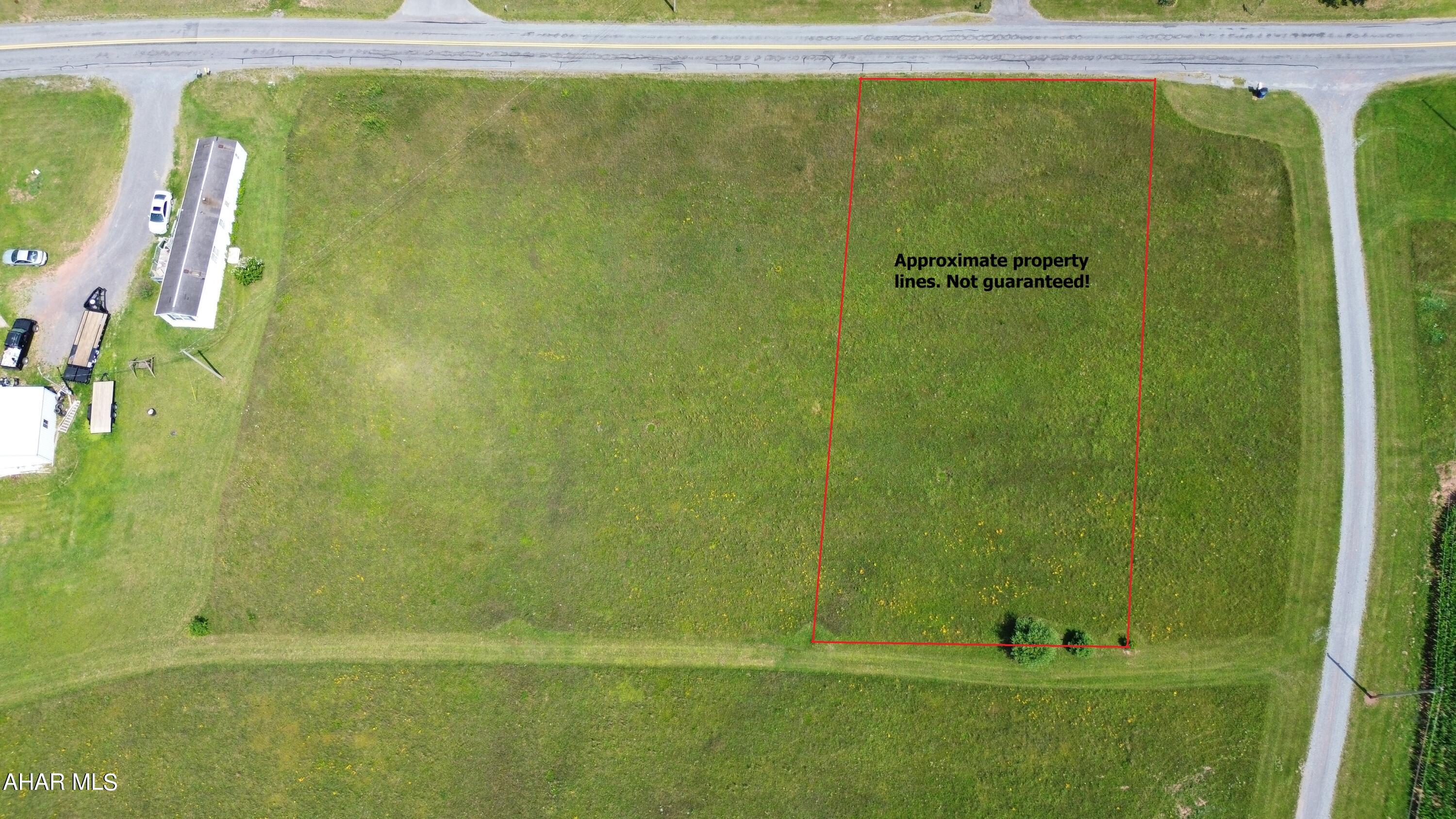 Nice building site in the country consisting of 0.46 acres with public sewer availability. Buyer is responsible for the sewer tap fee and confirming access. Emily Hartman is deceased.